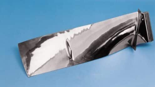 Metal item with smooth finished surface