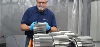 Man working on overflow parts