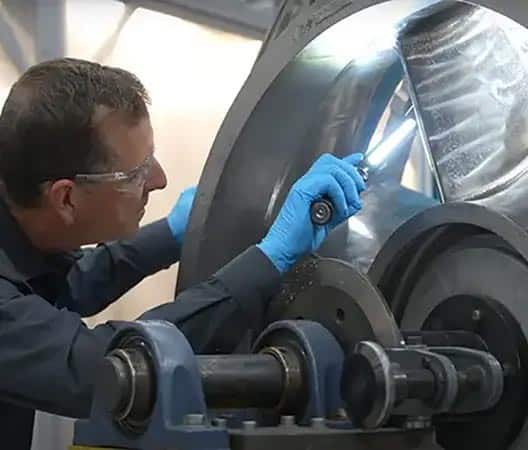 Man inspecting aerospace finishing