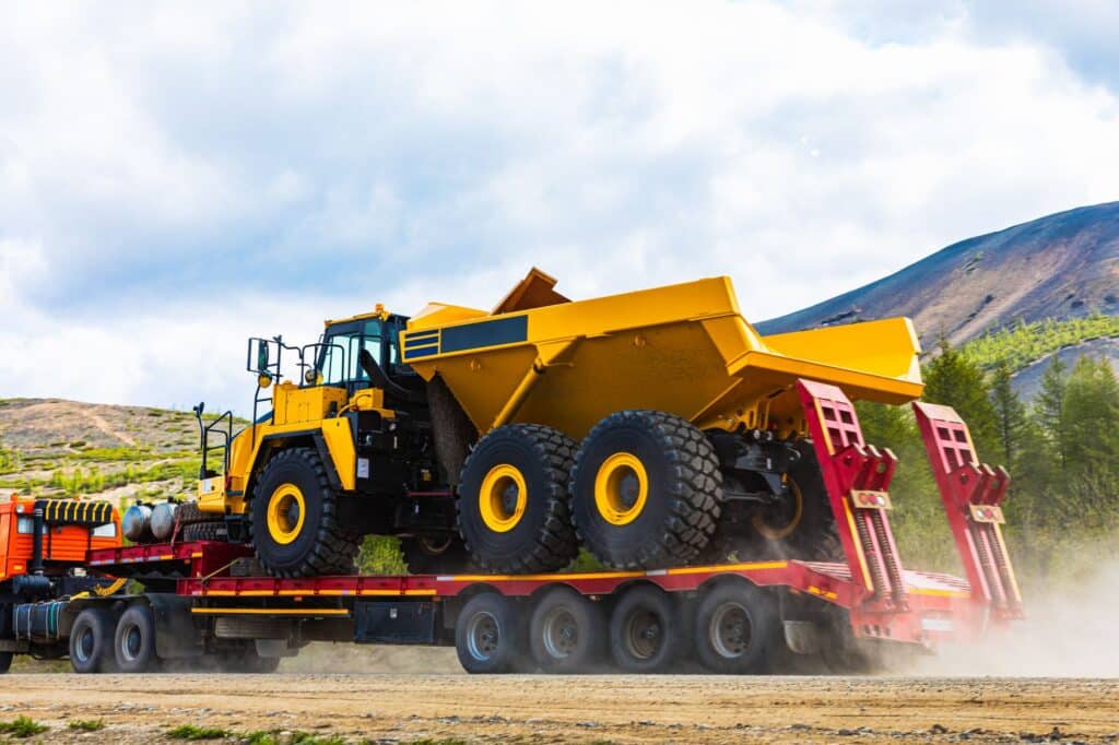 Industrial construction equipment on a large trailer